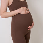 Women's bra-free bodysuit with no front seam to avoid camel toe, featuring breathable, moisture-wicking fabric and a flattering fit for pregnancy.