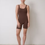 Flattering bra-free bodysuit with stretchy, moisture-wicking fabric, no front seam to prevent camel toe, perfect for Pilates