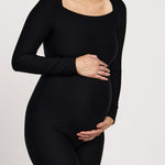 Maternity bodysuit with long sleeves and short legs, suitable for big busts, featuring stretchy, breathable fabric and a flattering cut for Pilates or yoga during pregnancy