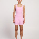 Women's pink sleeveless bodysuit with in-built bra, perfect for yoga, Pilates, or maternity wear, 5-inch leg length