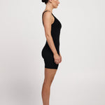 Bra-free activewear bodysuit with a classic fit and 6-inch shorts, made from moisture-wicking, stretchy fabric for Pilates