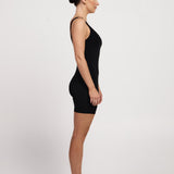 Bra-free activewear bodysuit with a classic fit and 6-inch shorts, made from moisture-wicking, stretchy fabric for Pilates