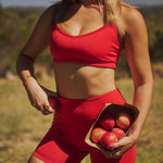 size-8-model-wearing-estroni-merino-scarlet-red-sports-bra-crossback-andstroni-merino-scarlet-red-shorts-5"