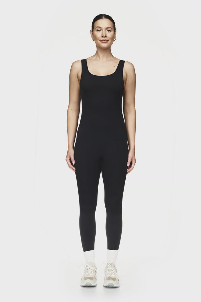 Full-length sleeveless bodysuit with built-in bra, made from stretchy breathable fabric, ideal for Pilates workouts